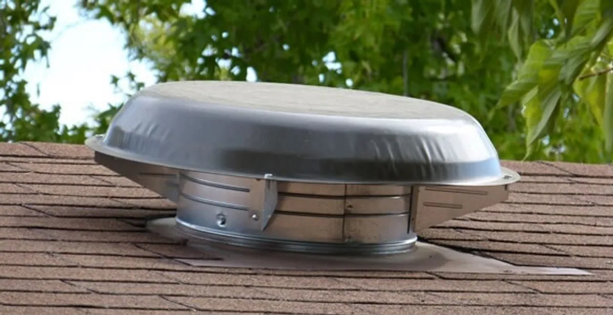 attic fan installation services with low-profile roof ventilation unit in Chandler, AZ