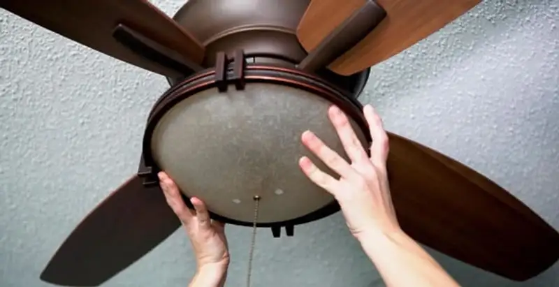 Ceiling fan repair and reinstallation on ceiling mount in Chandler, AZ