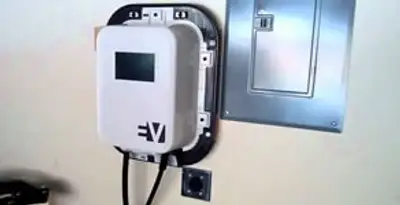 Electric car charger installation with wall-mounted EV charging station in Chandler, AZ