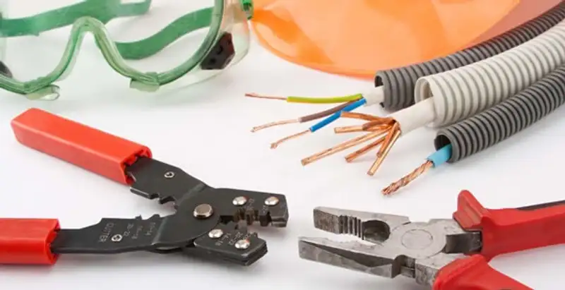 Electrical wiring repair with professional tools and safety equipment in Phoenix, AZ