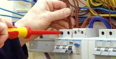 electrician services performing professional electrical panel wiring and connections in Chandler, AZ