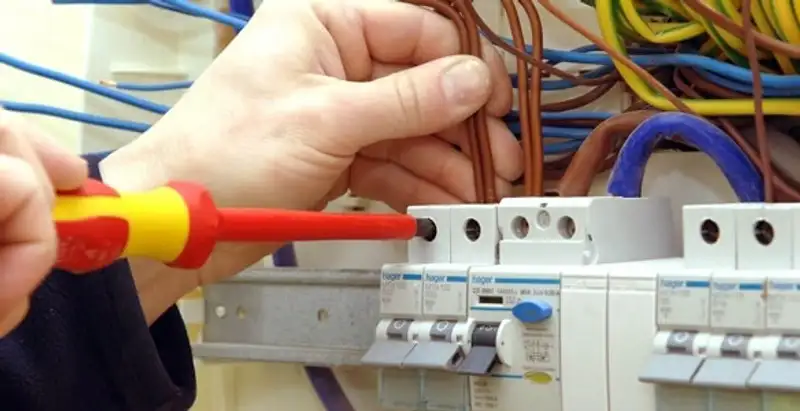 electrician services performing professional electrical panel wiring and connections in Chandler, AZ