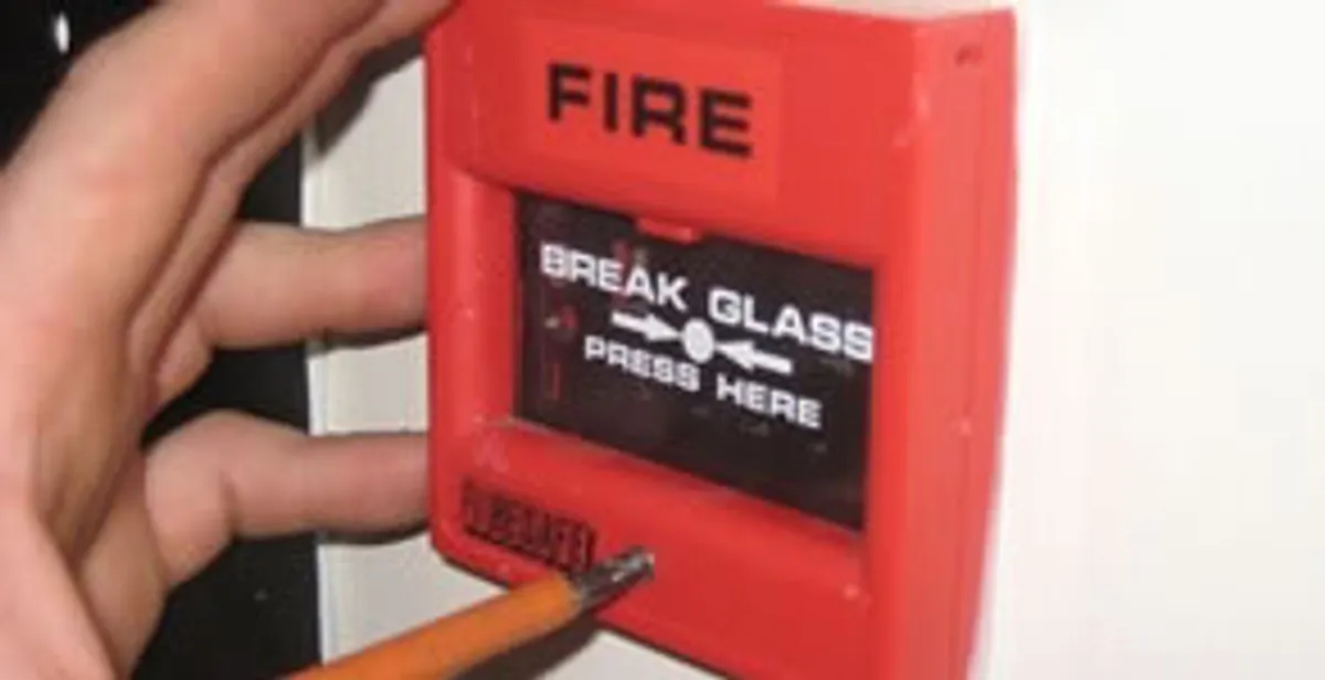 fire alarm installation service showing manual fire alarm pull station installed by licensed electricians in Chandler, AZ