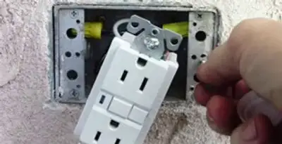 gfci circuits service showing installation of a ground fault circuit interrupter outlet by licensed electricians in Chandler, AZ