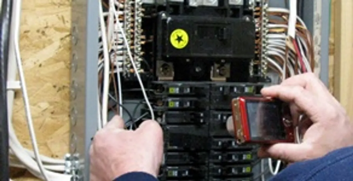 Home electrical inspection of circuit breaker panel by licensed electrician in Chandler, AZ