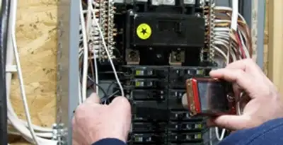 Home electrical inspection of circuit breaker panel by licensed electrician in Chandler, AZ