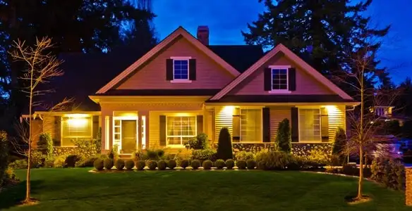 security light installation services illuminating a residential exterior at night in Chandler, AZ