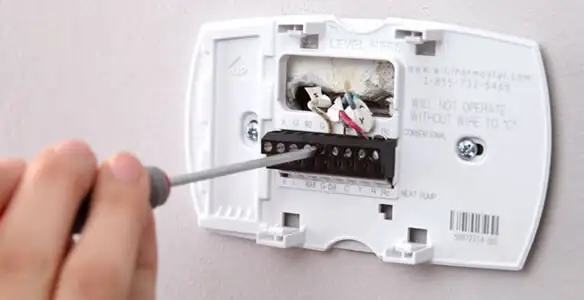 Thermostat installation service with proper wiring and secure wall mounting in Chandler, AZ