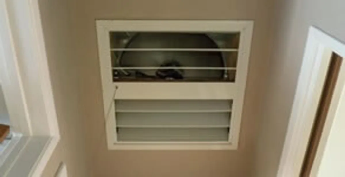 whole house fan installation services with ceiling-mounted ventilation system in Chandler, AZ